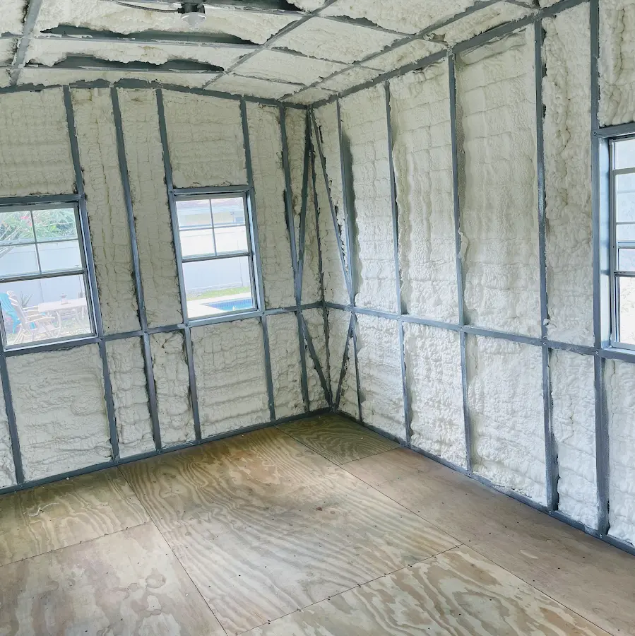Closed-cell spray foam insulation applied to wall cavities in a residential project in Fruitland